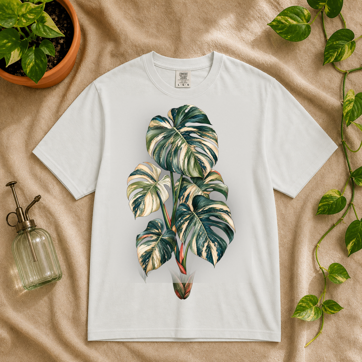 Variegated Monstera Graphic T-Shirt in White featuring cream marbled monstera artwork