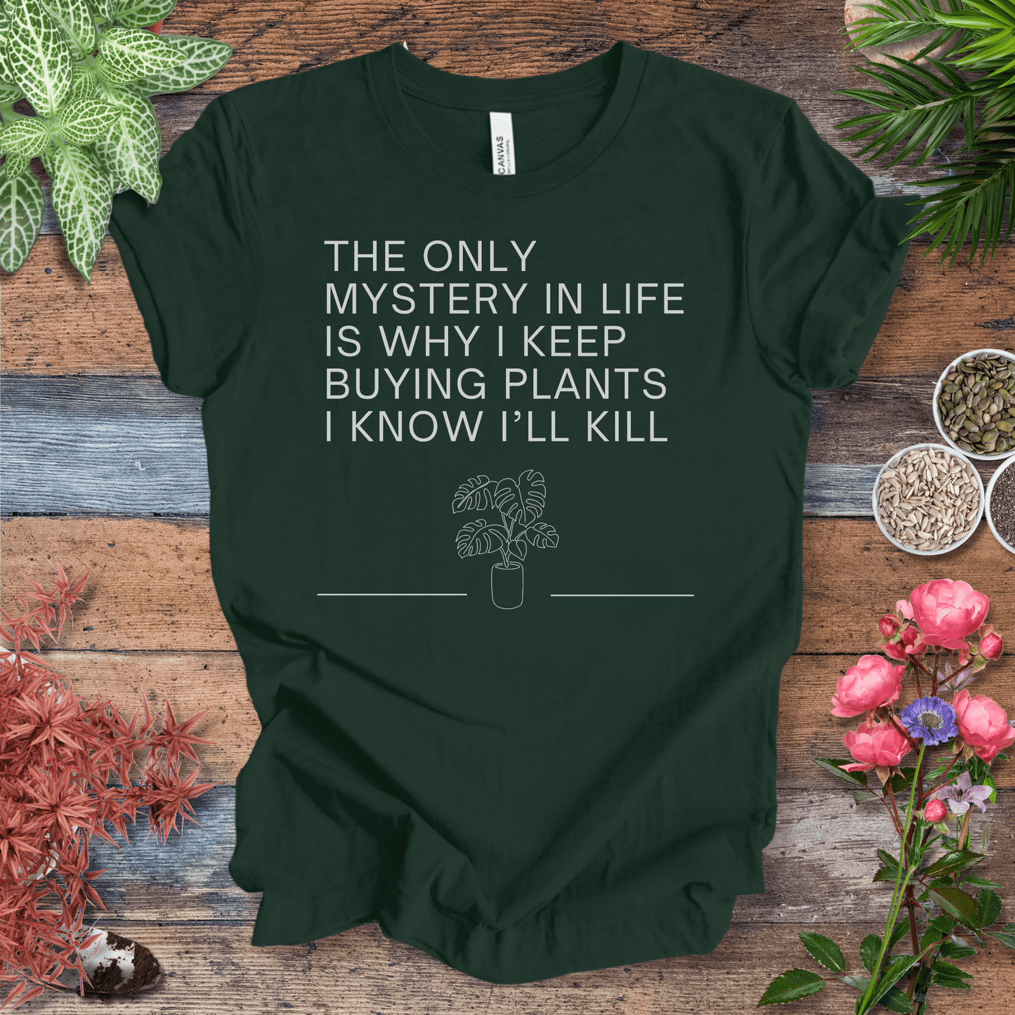 Printify T-Shirt Forest / S The Only Mystery Is Why I Keep Buying Plants I Know I’ll Kill – Monstera | Sassy Plant Tee
