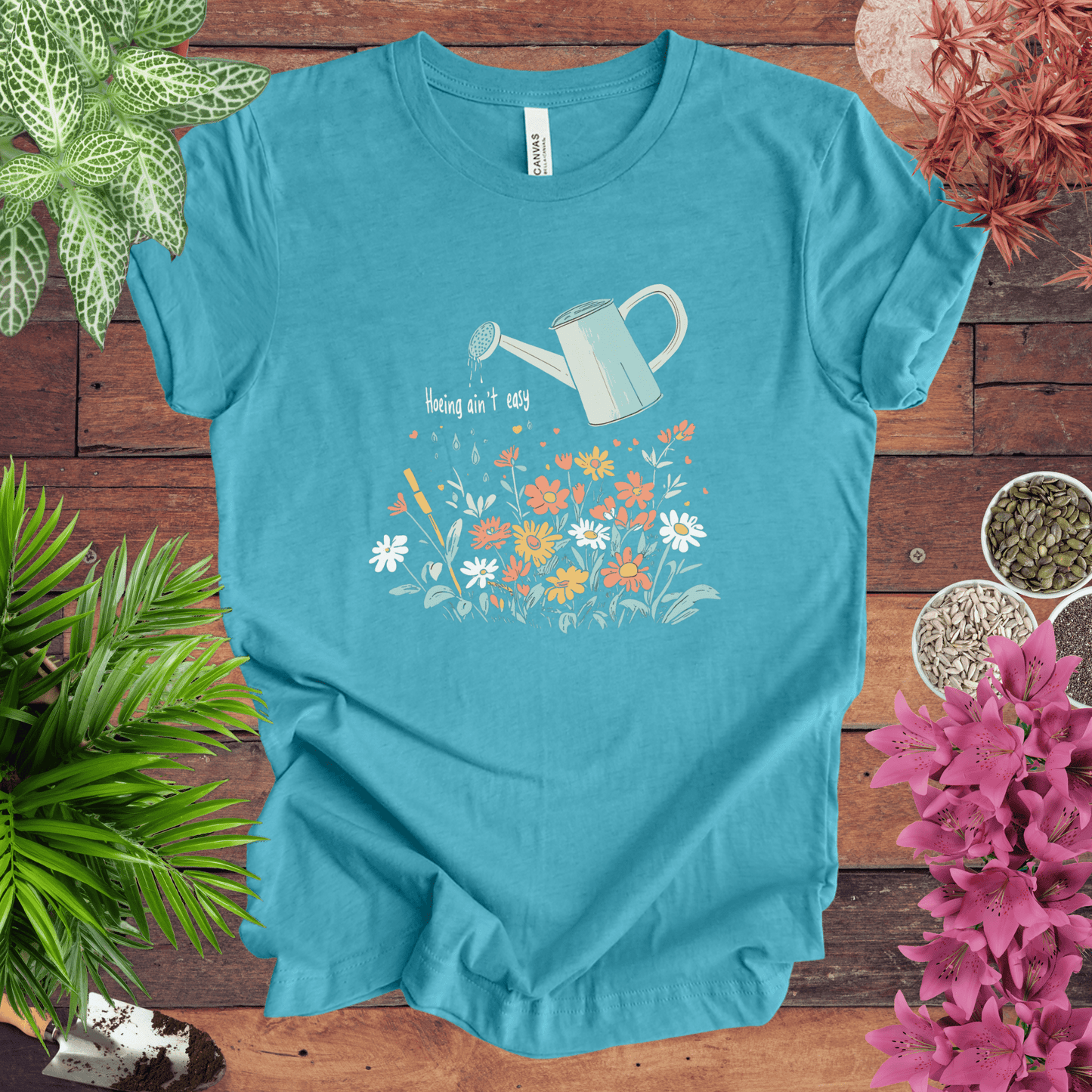 Printify T-Shirt Heather Aqua / S Hoeing Ain’t Easy Floral Watering Can T-Shirt