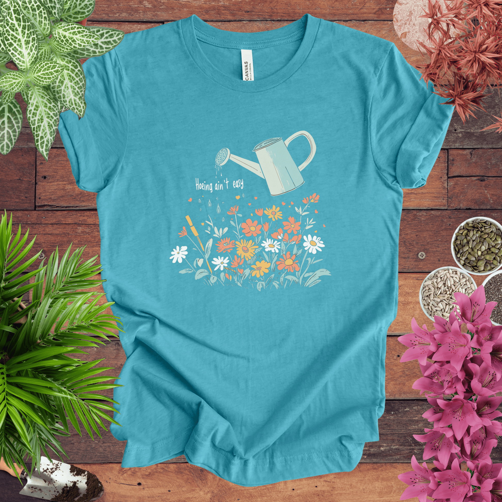 Printify T-Shirt Heather Aqua / S Hoeing Ain’t Easy Floral Watering Can T-Shirt