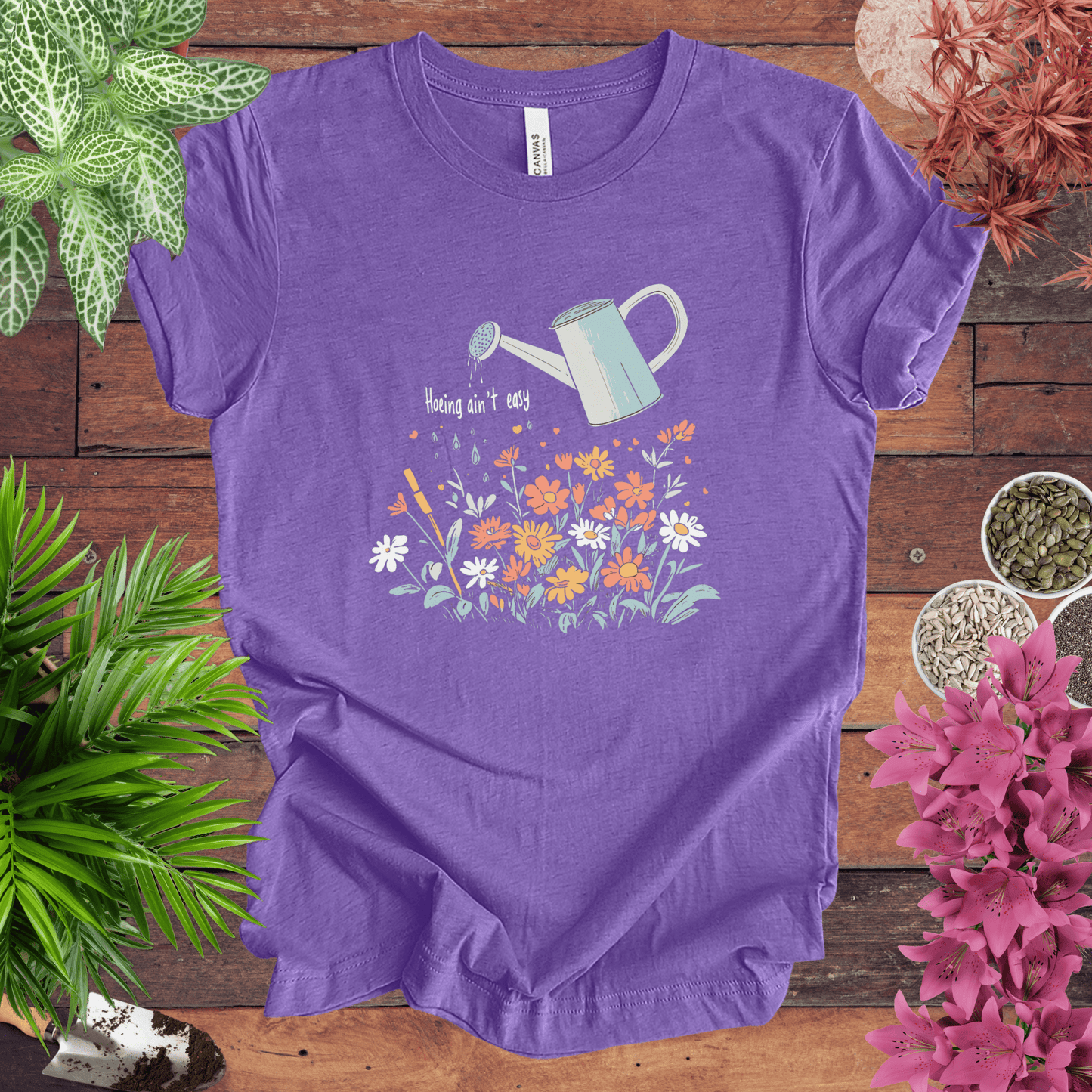 Printify T-Shirt Heather Team Purple / S Hoeing Ain’t Easy Floral Watering Can T-Shirt