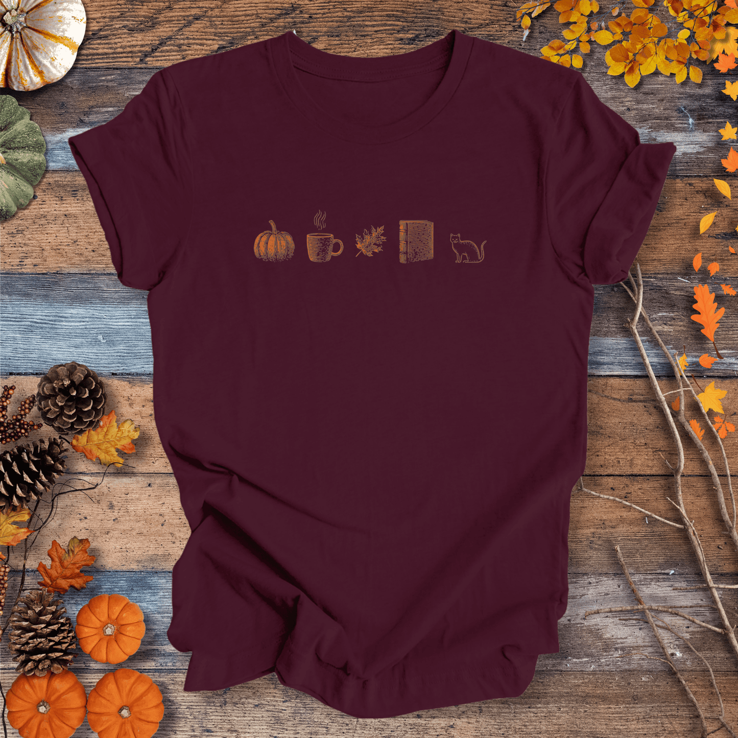 Printify T-Shirt Solid Maroon / S Autumn Icons Row Shirt – Pumpkin Coffee Leaf Book Cat | Unisex Cotton