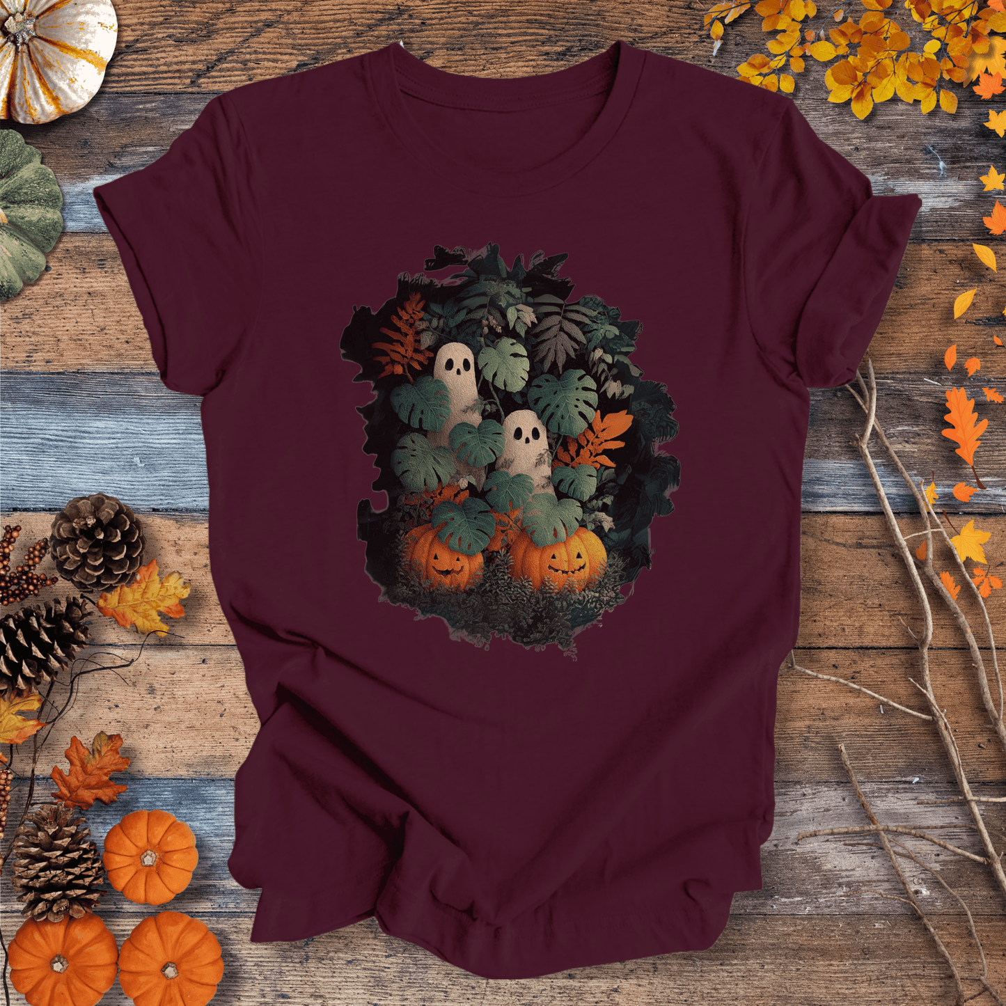 Printify T-Shirt Solid Maroon / S Monstera Ghosts & Pumpkins – Halloween Houseplant Shirt (Unisex)
