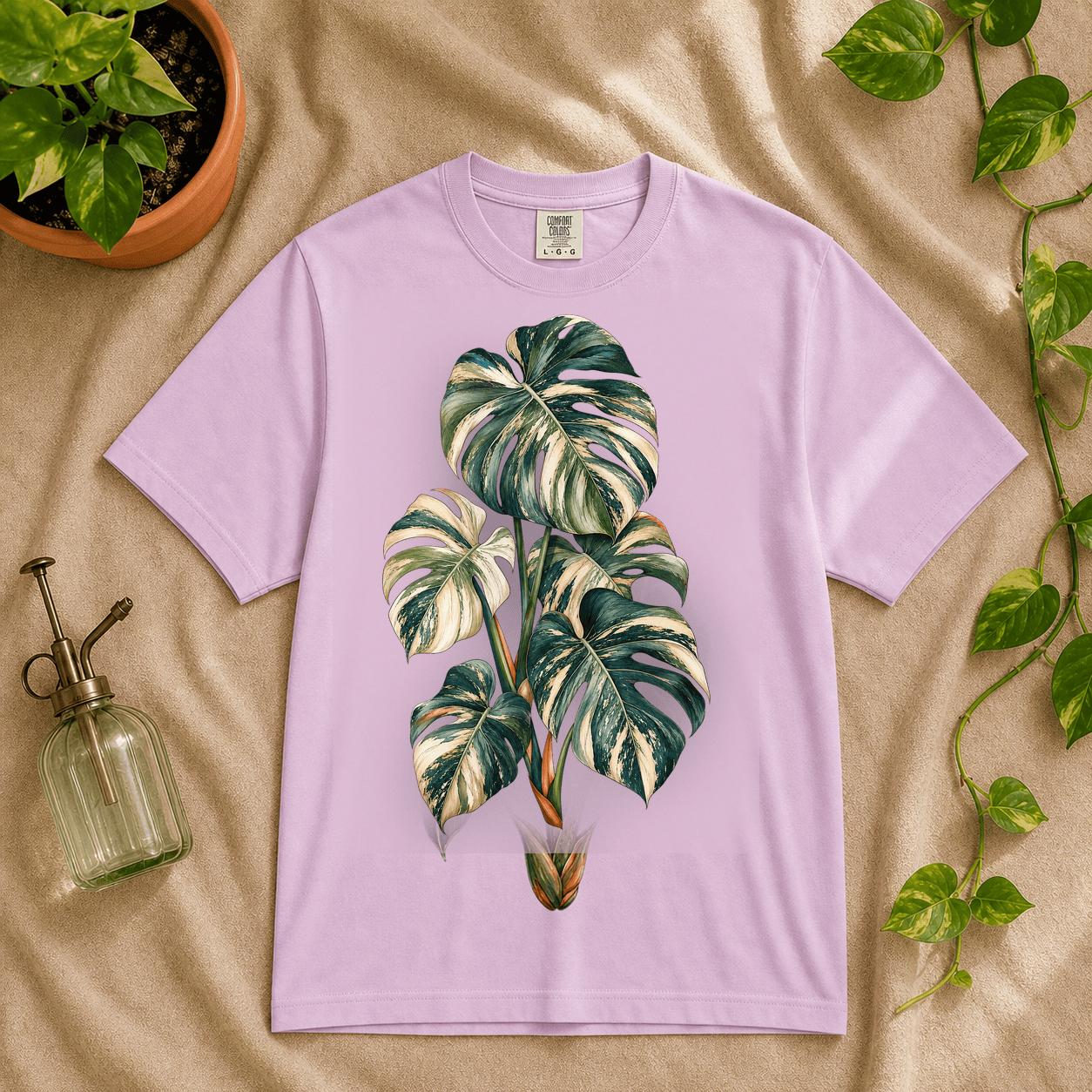 Variegated Monstera Graphic T-Shirt in Orchid featuring cream marbled monstera artwork