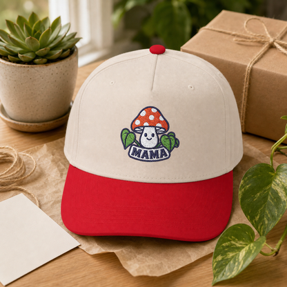 Mama Mushroom embroidered hat in red and natural on a plant lover gift table