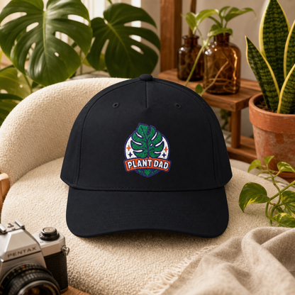 Plant Dad Hat in black styled in an indoor jungle apartment scene