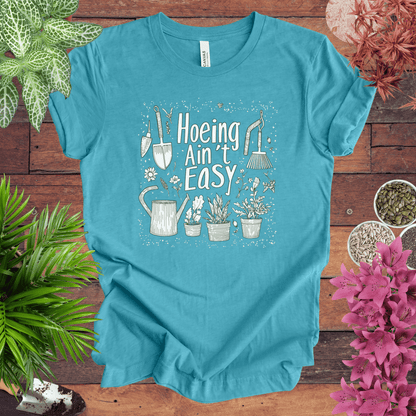 Printify T-Shirt Heather Aqua / S Hoeing Ain’t Easy Funny Gardening T-Shirt