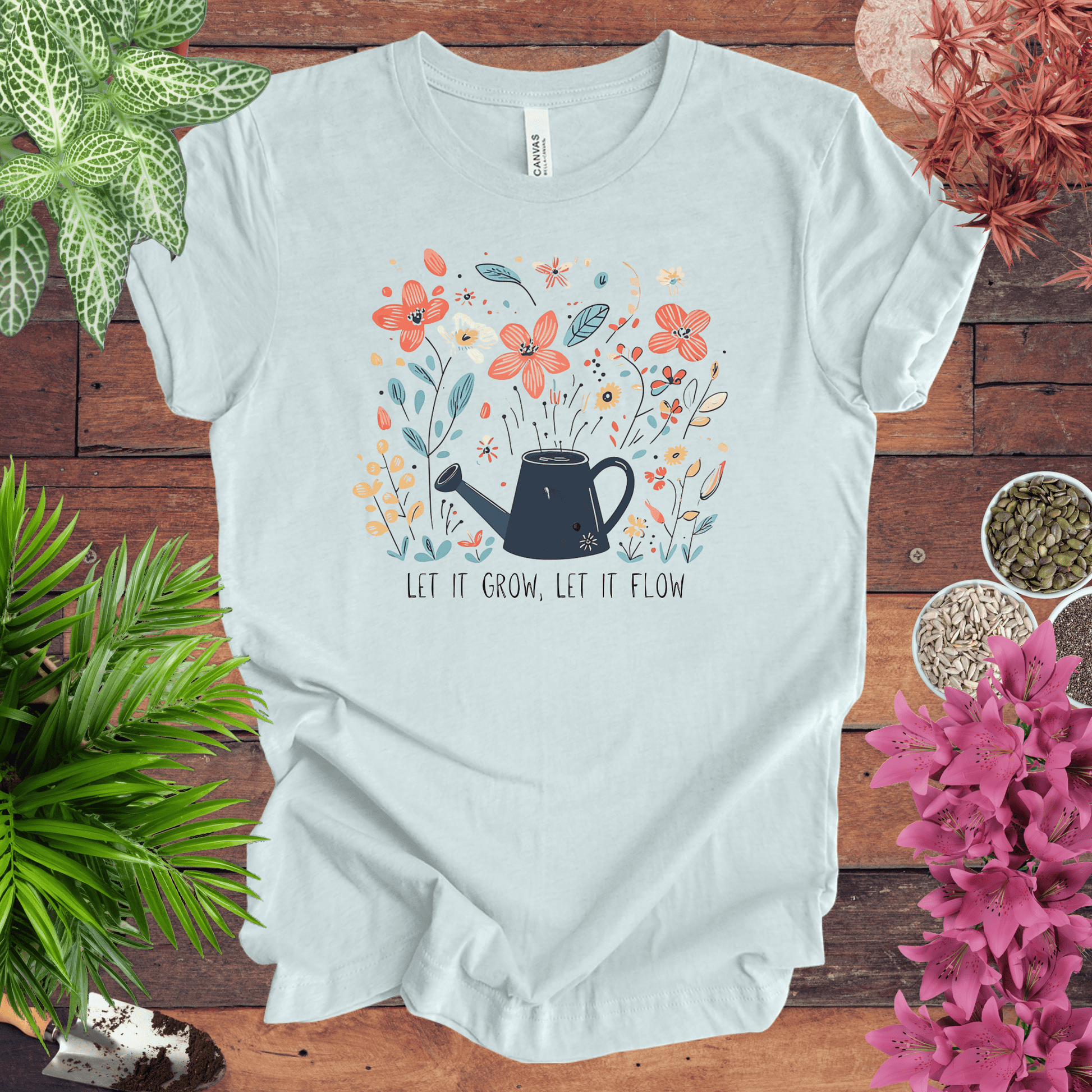 Printify T-Shirt Heather Ice Blue / S Whimsical Watering Can and Flowers T-Shirt